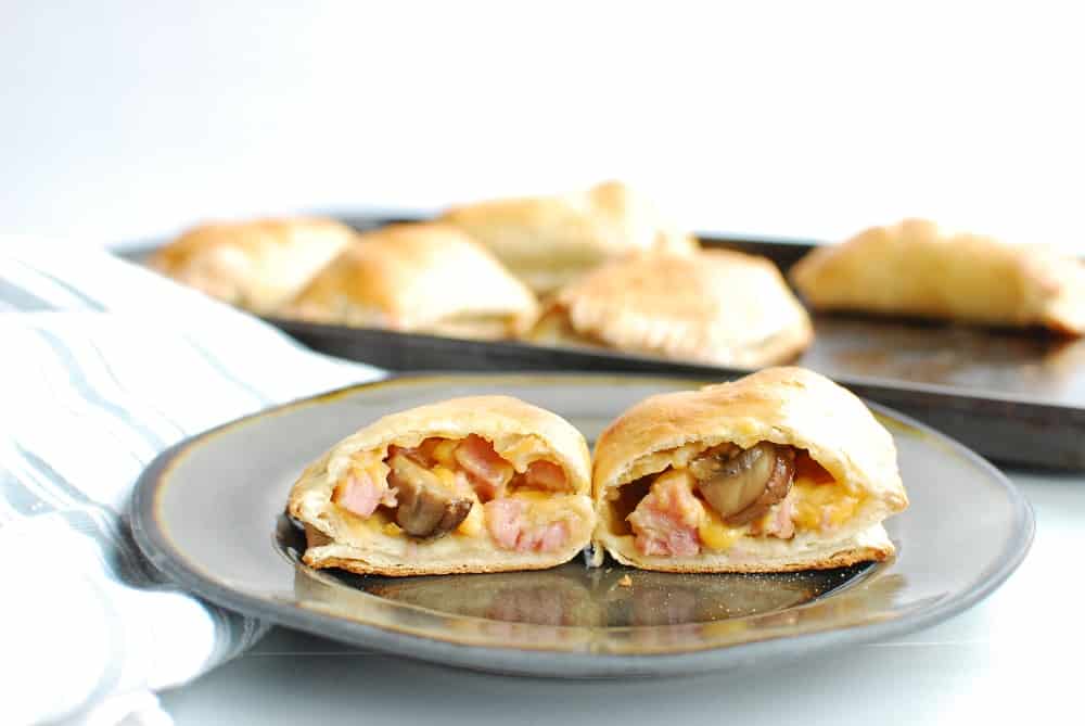 Homemade Mushroom Ham and Cheese Pockets Snacking in Sneakers