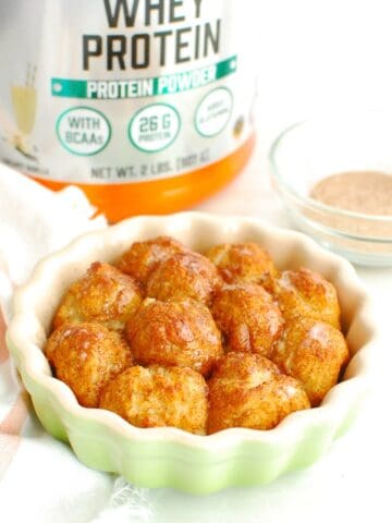 A ramekin filled with high protein single serve monkey bread.